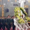 Solemn funeral held for 12 martyrs in military drill incident