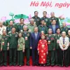 Party chief meets veteran revolutionaries, war heroes, policy beneficiaries