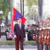 Top Lao leader hosts welcome ceremony for Vietnamese State President