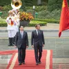 In Pictures: Official welcome ceremony for French President and his spouse on State visit to Viet Nam