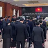 OVs, international friends in Laos pay tribute to former President Tran Duc Luong
