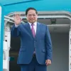 PM Pham Minh Chinh leaves for WEF meeting, working visit to China