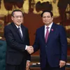 PM urges stronger Vietnam – Laos cooperation in labour, social affairs
