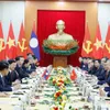 Top Vietnamese, Lao leaders hold talks in Hanoi