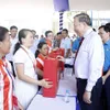 Party General Secretary and State President meets workers in Ho Chi Minh City
