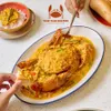 Hanoi foodaholics enjoy famous Ca Mau crab in flavorful Thai curry sauce