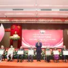Party, State leader presents Party-membership badges to veteran members