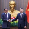 PM Le Minh Hung receives Malaysian Minister of Defence Mohamed Khaled bin Nordin