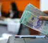 Lãi suất qua đêm giảm về 4,9%/năm