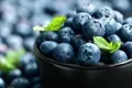 https://cdn-images.vtv.vn/thumb_w/630/2015/2-blueberries-shutterstock-0-1442913746578.jpg