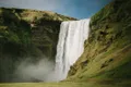 https://cdn-images.vtv.vn/thumb_w/630/2015/there-are-thousands-of-waterfalls-throughout-the-country-skgafoss-is-one-of-the-largest-and-it-is-rumored-that-there-is-a-treasure-hidden-behind-the-falls-1426156926419.jpg