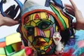https://cdn-images.vtv.vn/thumb_w/630/Uploaded/daoluunhanai/2014_07_28/bodypainting_2014_004.jpg