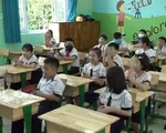 Học sinh tiểu học tại TP.HCM đi học trở lại