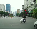 Phóng nhanh vượt đèn đỏ, nam thanh niên gây họa cho người đi xe máy