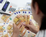 ECB chấm dứt chính sách nới lỏng tiền tệ