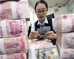 Nhân dân tệ giảm mạnh, Trung Quốc hạ tỷ lệ dự trữ ngoại hối