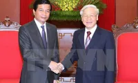 Party leader receives Lao diplomat