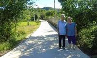 Old couple’s efforts pave way for new road