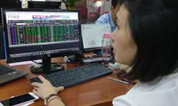 Shares rise amid growing caution