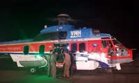 Injured fisherman brought to shore by helicopter