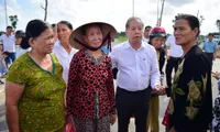 Relocated people in Thuong Thanh visit new resettlement area