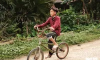 13-year-old boy’s bicycle and slippers go to charity auction