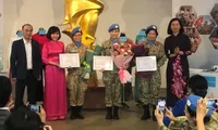 Peacekeeping officers present souvenirs to Vietnam Women's Museum