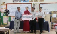 Gifts presented to students of Khmer-Vietnam friendship primary school in Cambodia