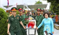 Remains of martyrs repatriated from Laos reburied in Dien Bien