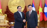 Vietnamese PM meets with top leader of Laos ahead of ASEAN Summits