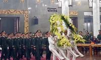 Solemn funeral held for 12 martyrs in military drill incident