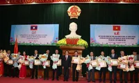 Hoa Binh collectives and individuals honoured with Lao accolades for education project