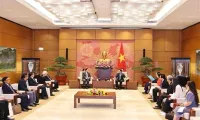 Vietnam, Laos agree to continue realising cooperation agreements