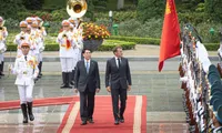 In Pictures: Official welcome ceremony for French President and his spouse on State visit to Viet Nam