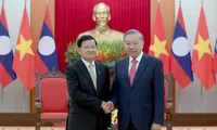 Party General Secretary hosts top Lao leader