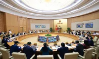 Prime Minister chairs regular government meeting connected with 34 provinces and cities