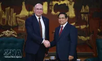 Prime Minister urges closer ties between Vietnamese, Russian news agencies