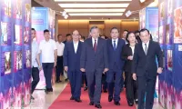 Party, State leaders visit exhibition honouring exemplary people