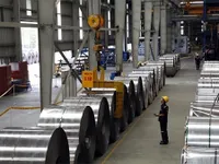 Yuan adjustment yet to affect firms