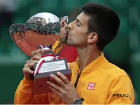 Tennis: Djokovic beats Berdych in Monte Carlo to set ATP record