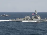 US says China plane landings in Spratly Islands escalate tensions