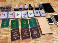 Malaysia phá đường dây làm hộ chiếu giả