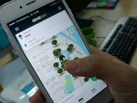 Grab, Uber và taxi truyền thống: “Cuộc chiến” chưa có hồi kết!