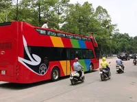 Hội nghị thượng đỉnh Mỹ - Triều: Đưa đón phóng viên miễn phí bằng xe bus 2 tầng