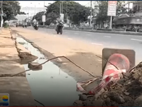 Né trạm cân, xe tải đi vào khu dân cư  làm vỡ tấm đan mương thoát nước