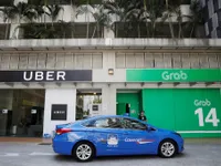 Thương vụ Grab mua Uber có dấu hiệu vi phạm pháp luật