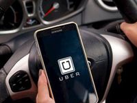 Uber cắt giảm gần một nửa khoản lỗ