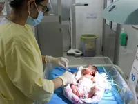 Mong manh sự sống của hai mẹ con bị cúm A/H1N1