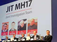 Russia rejects blame on its three soldiers for MH17 plane crash