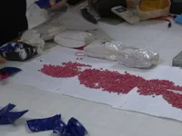 Bắt đối tượng vận chuyển 6 bánh heroin, 1 kg ketamin và 12.000 viên ma túy tổng hợp
